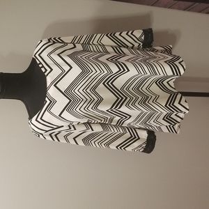 Cream and Black Chevron top with sequin cuffs